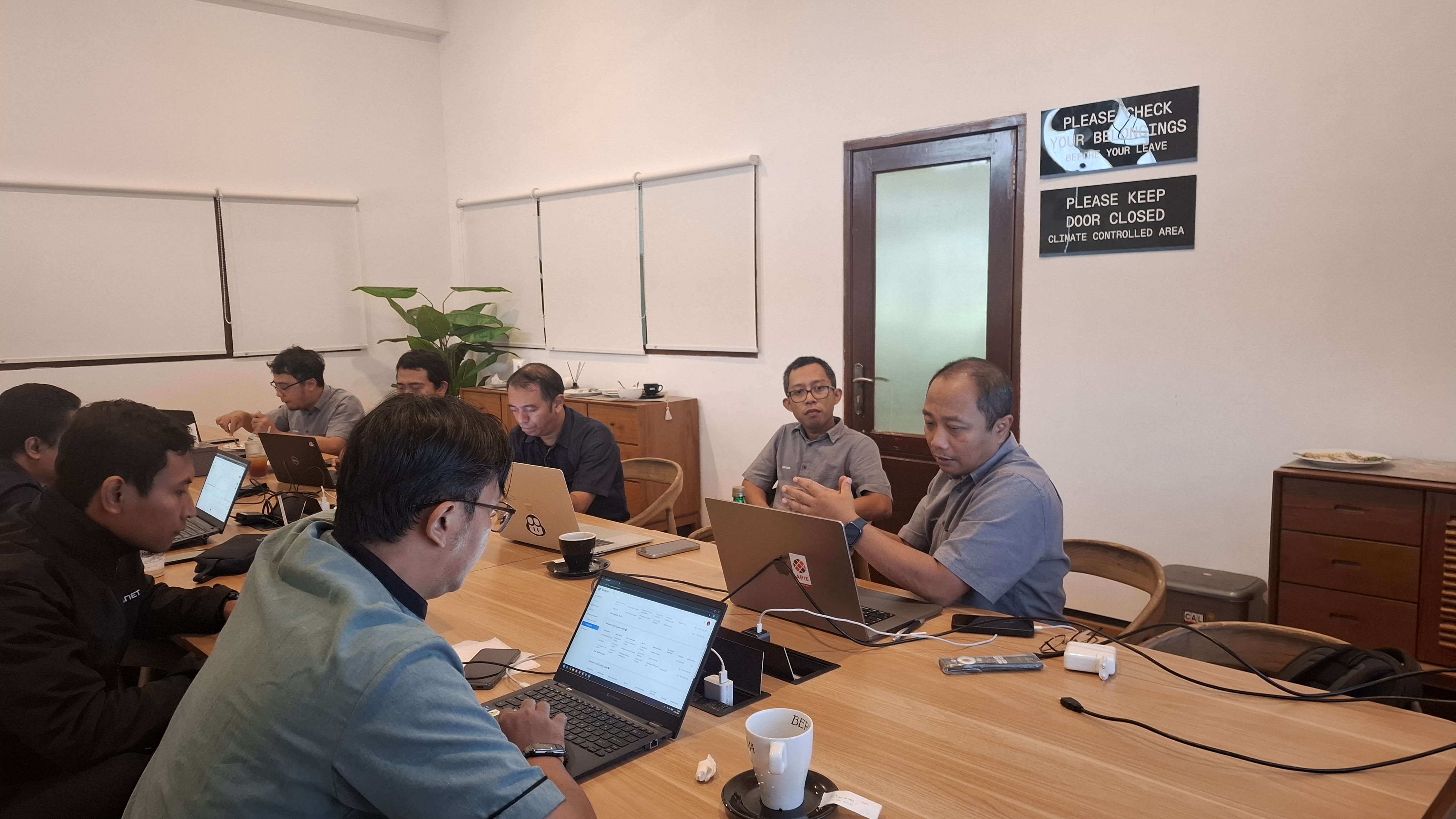 Team discussing workshop plans for IDREN participants